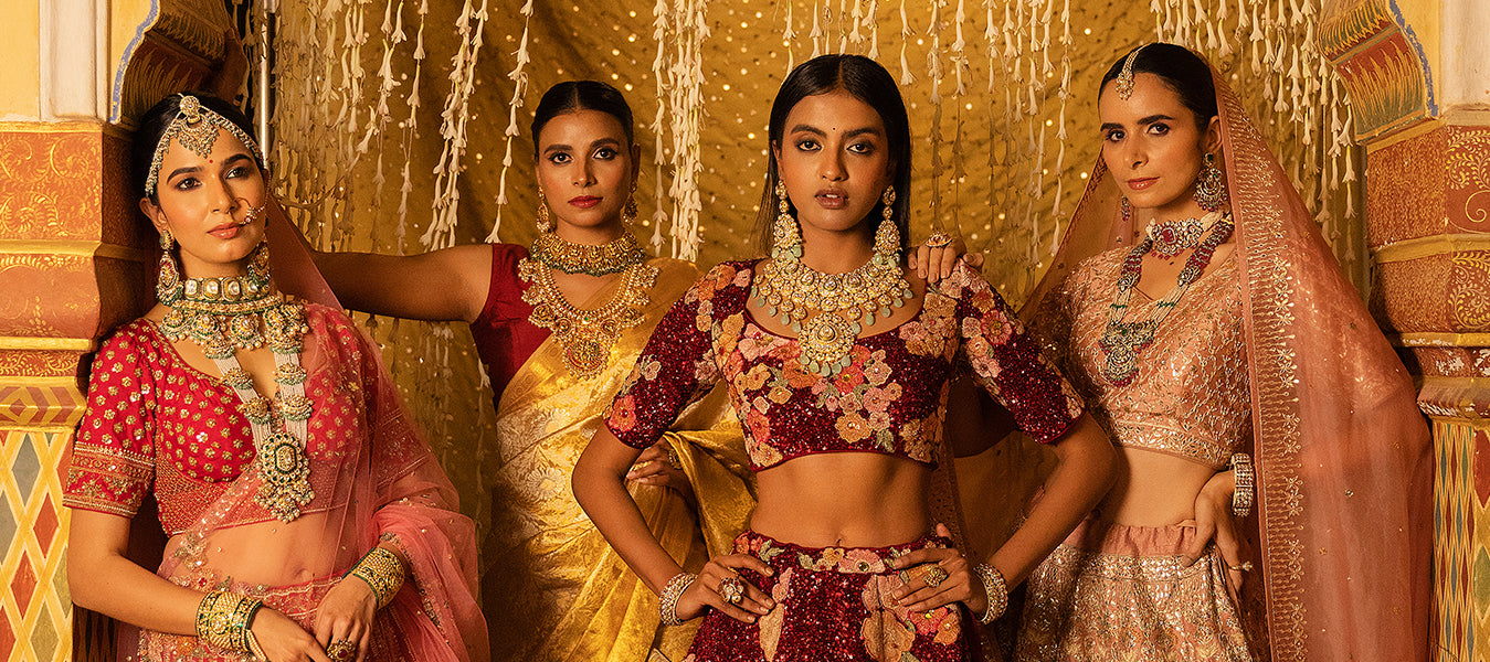 Models wearing traditional Indian bridal outfits and jewelry